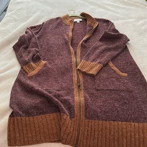 Woman’s zip up cardigan burgundy with orange trim new never worn